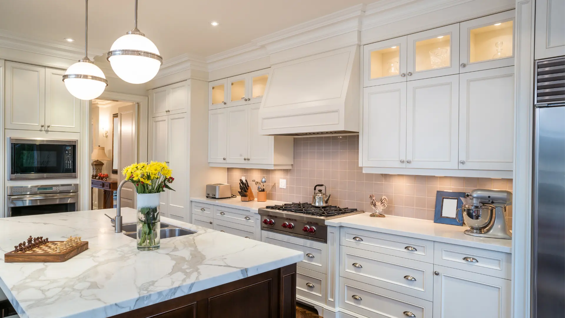 Bright, refinished kitchen cabinets by Third Coast Painting